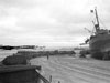 Trucks queuing to load from a dried out ship.