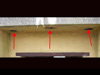 Three vertical pipes equally spaced.