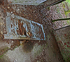 Louvered door.
