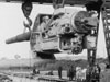 Lowering the gun in place.