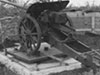 This is a gun sitting on a type of turntable that may have been used here.