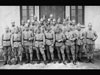 On the picture "Souvenir de Notre Arrivee" - Souvenir of Our Arrival. This picture looks like it was taken in one of the camps established behind the line where troops could be rested, mustered, trained and then supply replacements to the line.