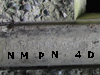 Writing set into the lintel possibly a makers type mark.
