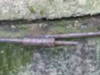 The steel rod that tightened the pieces together.