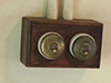 Double brass light switches.