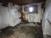 A machine gun room behind a steel plate.