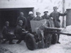 A small A/T gun outside a gun garage.