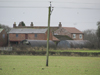 Two Nissen Huts.