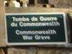 Commonwealth War Graves Commission plate on the the church yard wall.