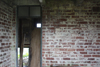 (I presume) the Corporals room. This hut was very hard to photograph inside as it has a lot of wire mesh bird pens.
