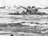 Swamped Sherman on the beach.