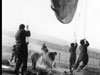 WAAF's being lifted off the ground.