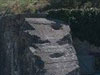Battle damage to the flanking wall.