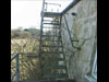Steel stairs to the roof.