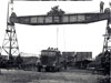 Crane to lower the gun on its mount.