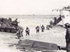 Soldiers disembarking from an LCI.