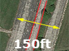 The roadway is now the the red lines but the runway is much wider.