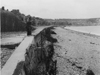 Sea wall with a bunker to the left.