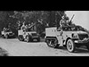 Half tracks pre loaded with artillery.