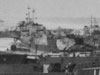I think the multi cammouflaged landing craft are Royal Navy and the more sea grey are USN types.