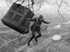 A British balloonist jumping over the trenches.