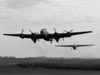 Halifax delivering a Horsa glider overseas.