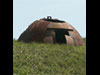 Allen Williams turret on the Isle of Wight. A round gun pit with an armoured turret that could hold a machine gun.