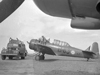 A Canadian Harvard being refueled.