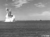 Exploding a sea mine.