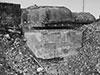 Bombed bunker at Batterie Crisbeq in Normandy showing what bombing can do to a bunker.