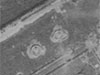 2 of at least three open emplacement 10cm le F.H.30(t) guns.
