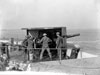A British 6" naval gun in action.