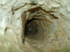 3" inch shell still embedded in the wall.