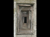 There are several machine gun embrasures in the walls.