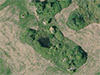 M272 Casemate Turm 1 from the air. You can still see the large crater now a pond.