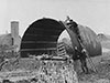 Nissen hut under construction.