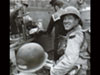An English speaking German officer took Lt Eldin [left] with three men, crossed a mine field to the main bunker entrance. Leaving two men to guard the rear door they continued inside.