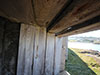 Wooden covers over the embrasure.