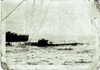 a U-Boote being captured by a Royal Navy destroyer..