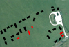 The roadway and white square,  the fuel compound, black the huts and red latrines.