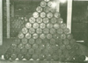 Piles of 12.2cm cases.