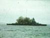 One of the battleships firing a broadside.