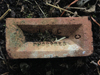 A brick, once part of the Ops. Block. A London Brick (LBC) manufactured locally by a subsidiary Phorpres.
