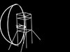 There is a good line drawing of a turret trainer in Paul Francis book 'British Military Airfield Architecture' page 151. It shows a concave screen which an image was directed on and a form of scaffolding tower with several levels, one with a dummy turret and another for a controller, there was also a power unit.