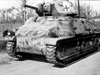 I believe it was a tank like this a Somua S35 tank that may have been hit by a PIAT antitank weapon.
