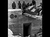 Loading equipment into a bunker.