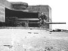 A British 3.7 inch captured gun being used inside a German casemate. Probably captured at Dunkirk.