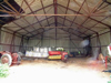 Inside a Robins hangar. Easy to erect and just an earth floor which also made them very cheap .There were around six here.