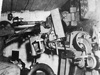 Machine gun fitting.