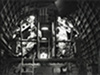Crew inside a Sunderland with their defence machine guns.
